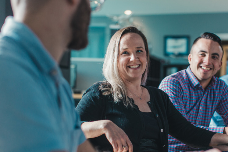 Guardian Jet's team discussing prominent business at morning meeting